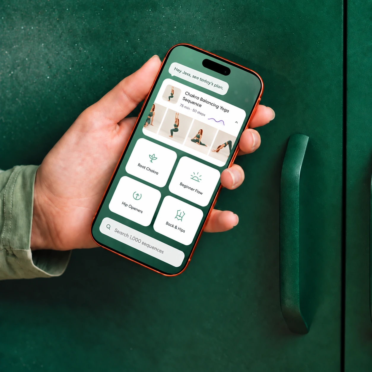 Yoga Space daily plan shown on a phone held in one hand